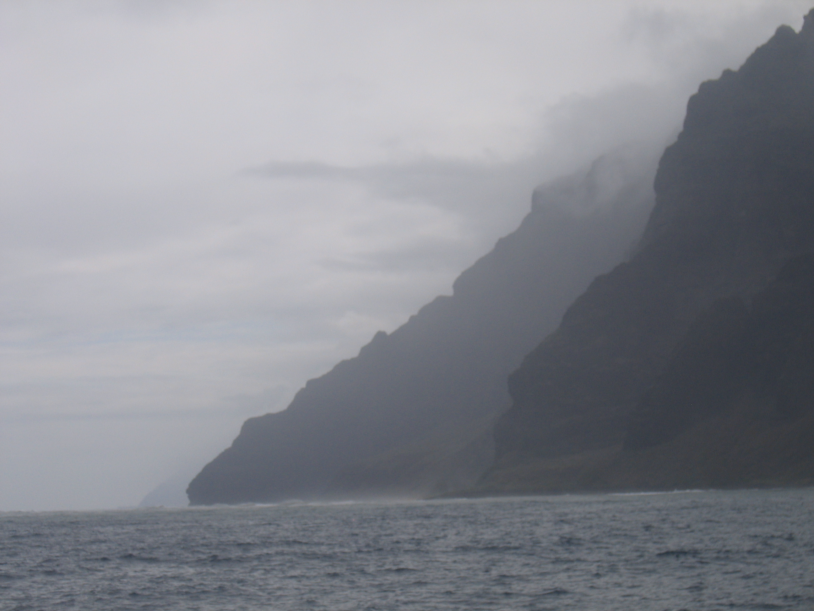 Misty cliffs by the ocean.