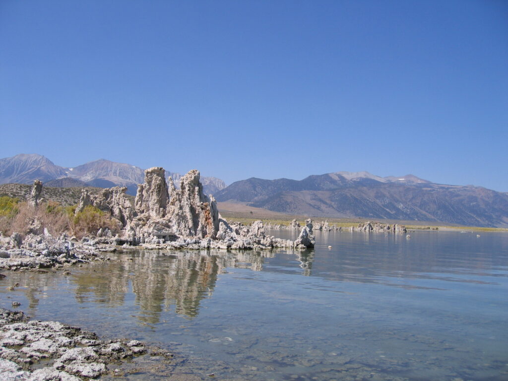 Mono Lake with tufa formations and mountains.