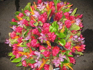 Vibrant bouquet of tropical flowers and leaves.