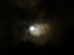 Moon with clouds on the side