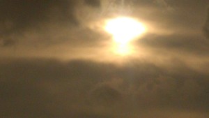 I took this Photo, of the Sun peaking through the clouds. Perfect timing