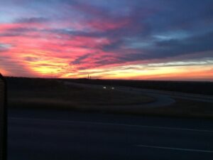 Vibrant sunset over a winding road.