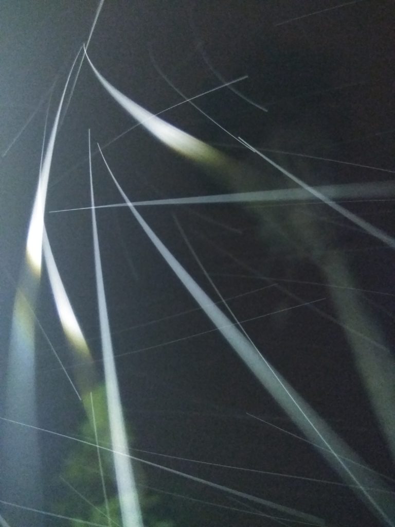 Night sky with streaks of light.