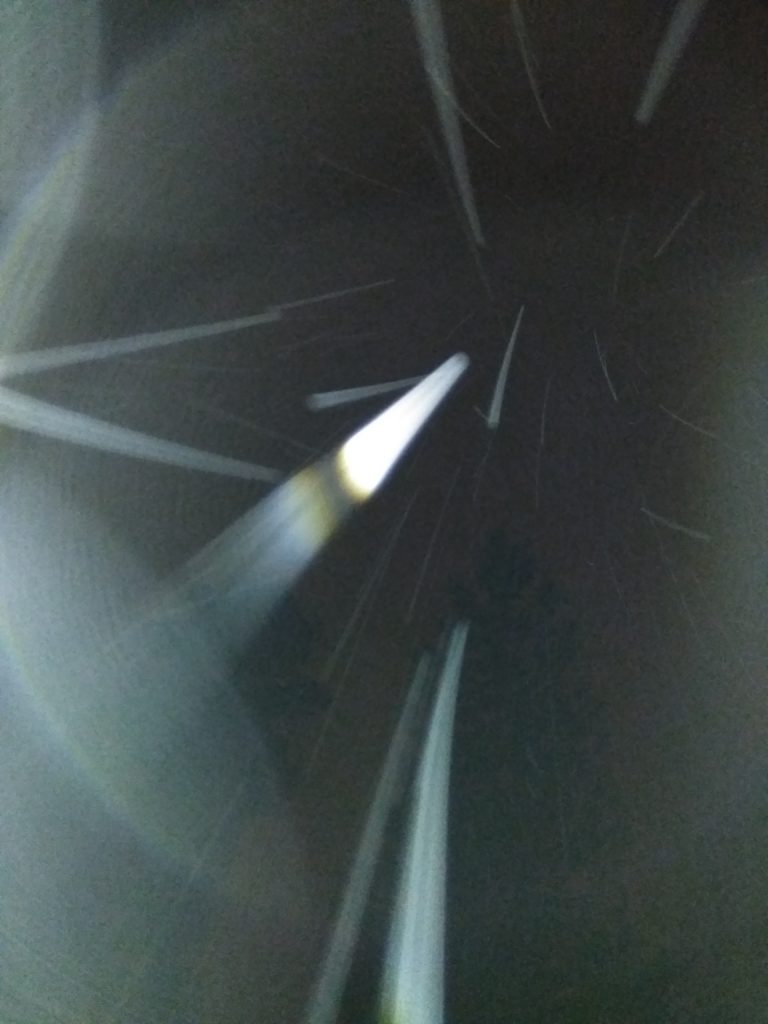 Abstract light streaks in dark background.