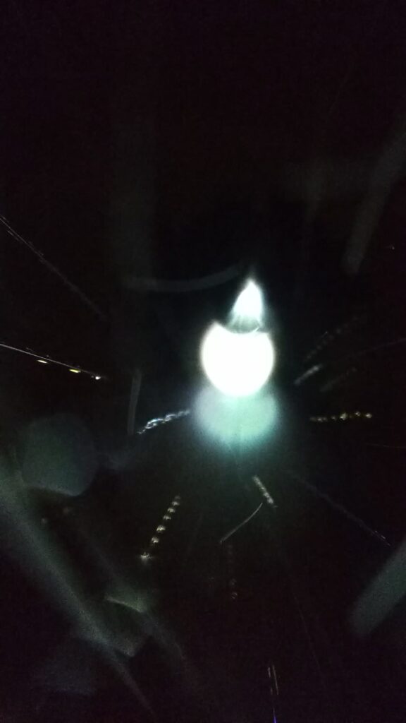 Bright light against a dark background.