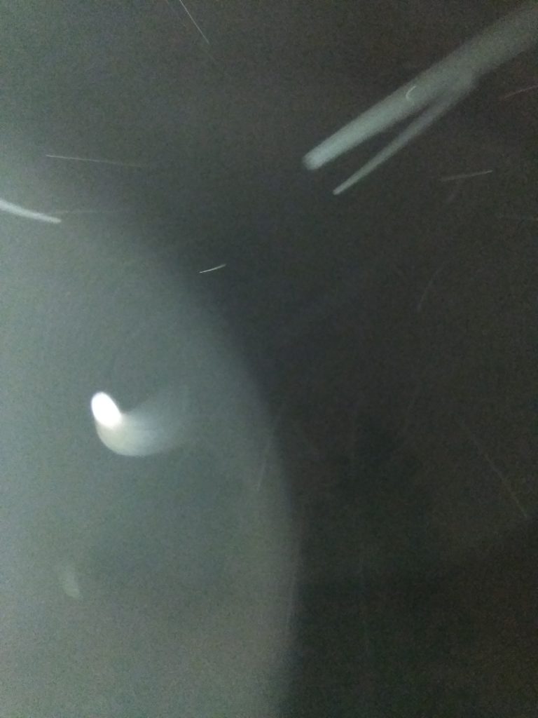 Blurry image with streaks of light.