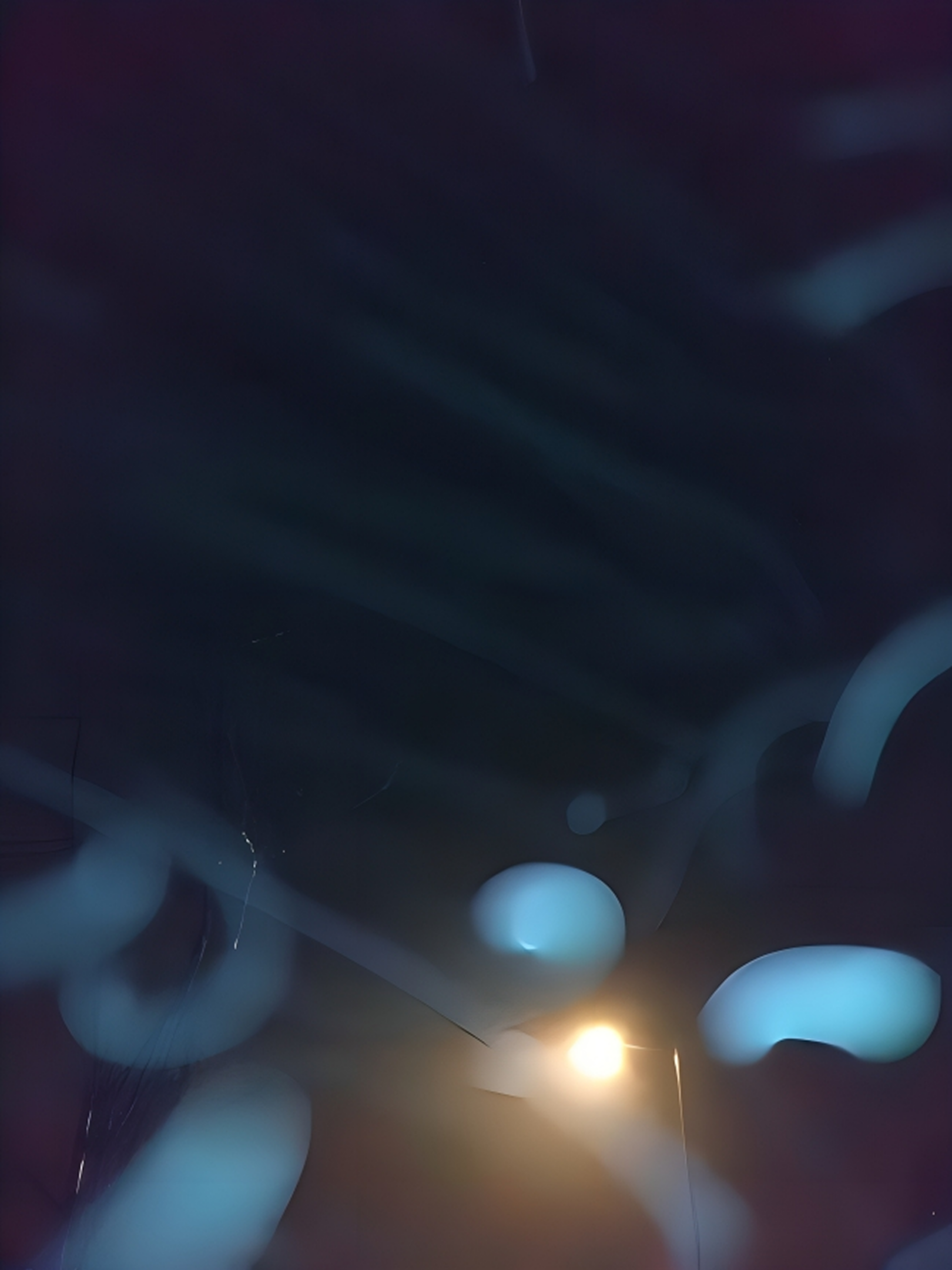 Blurry blue lights with bright streetlamp glow