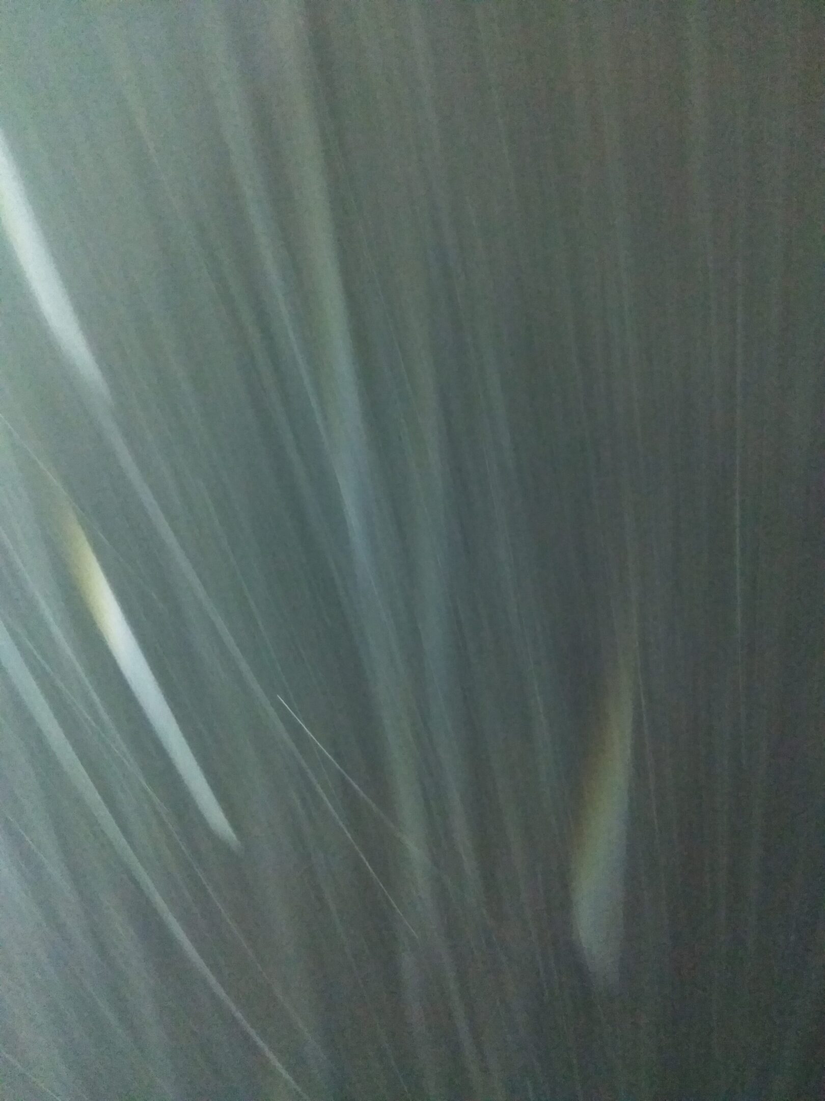 Blurred vertical lines in motion effect.