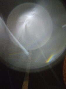Abstract light and shadow pattern on surface.