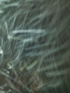 Blurry abstract pattern with light streaks.