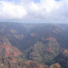 Canyon landscape with clouds overhead.