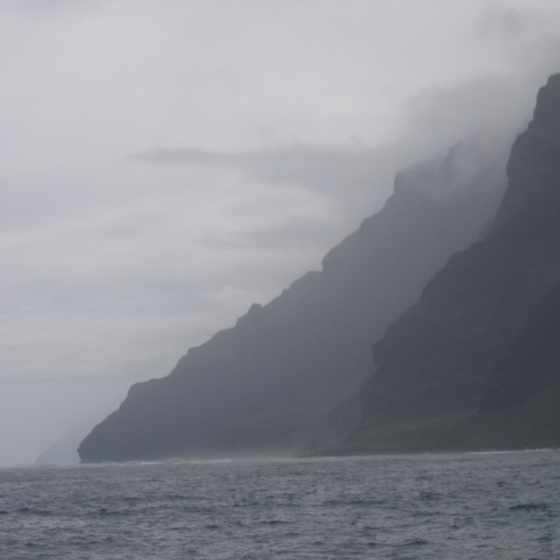 Misty cliffs by the ocean.