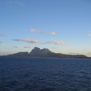 Ocean view with distant mountainous island.