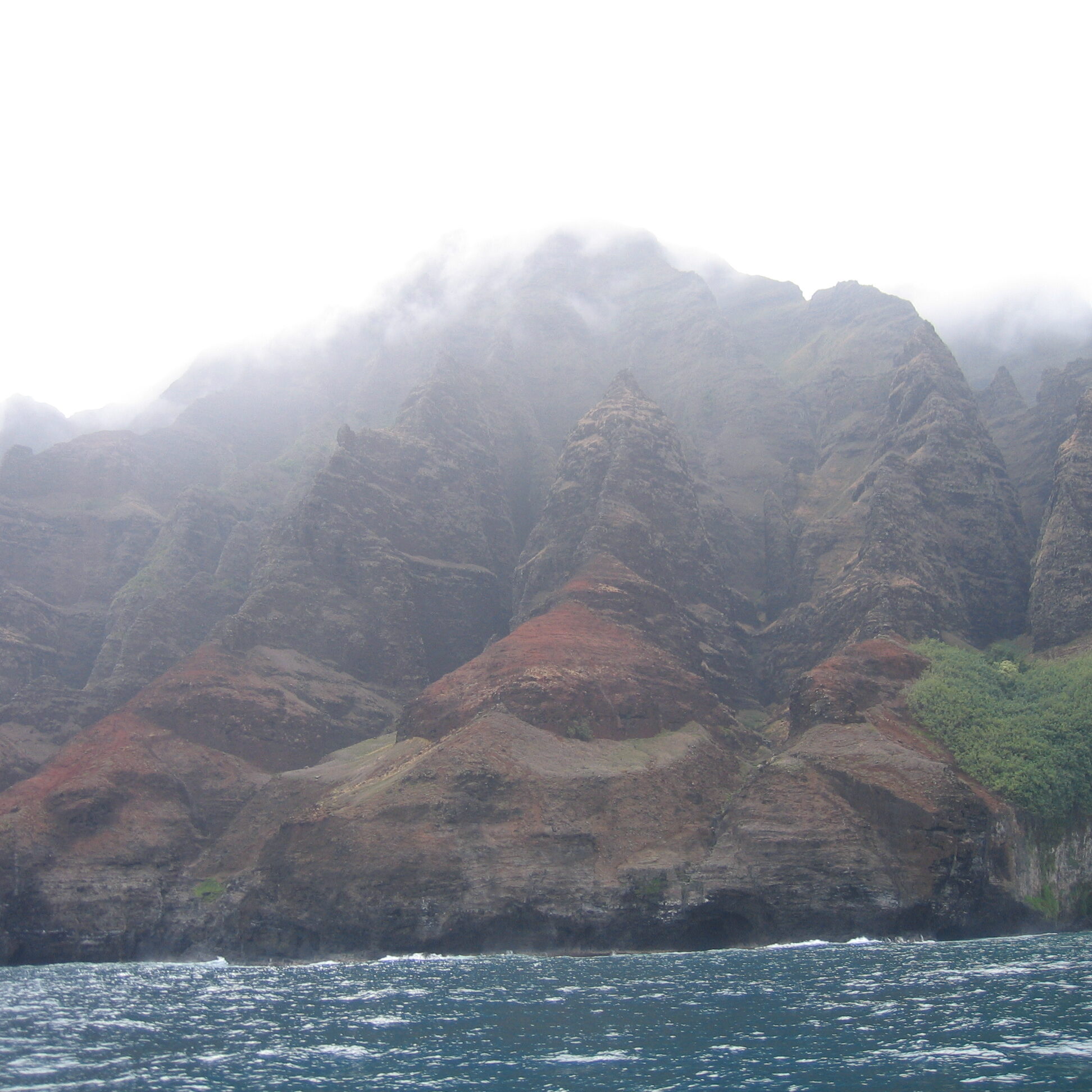 Misty cliffs by the ocean.
