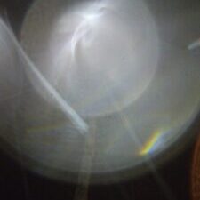 Abstract light and shadow pattern on surface.