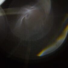 Abstract light and shadow with rainbow hues.