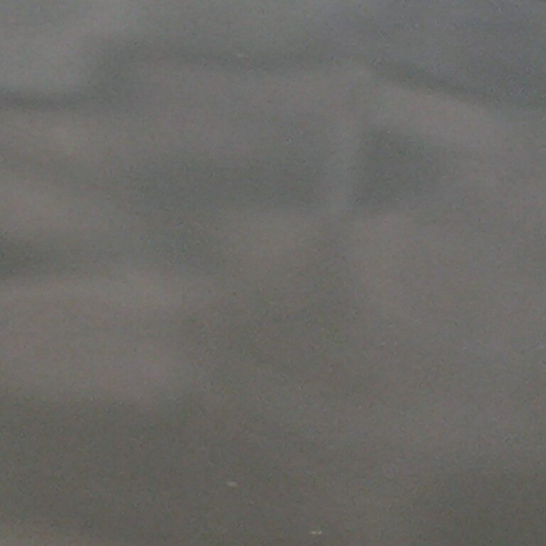 Blurred abstract gray and black texture.