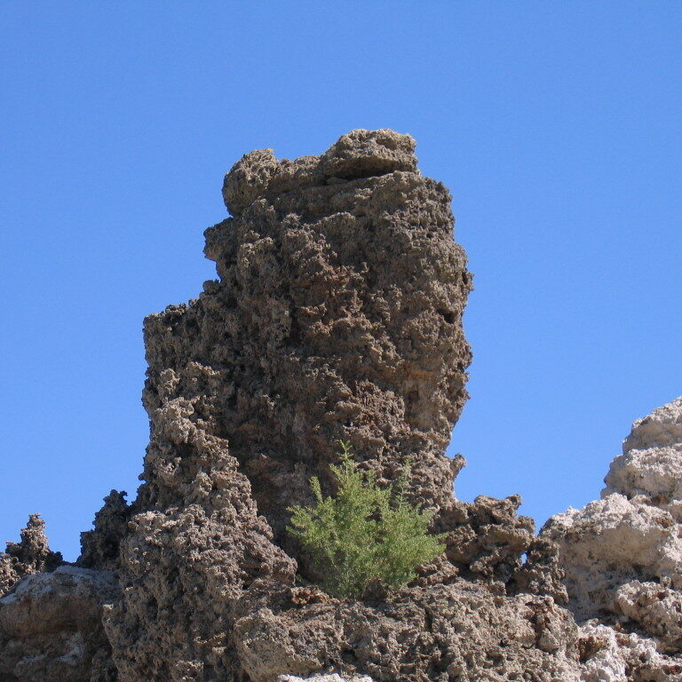 Rock formation against a clear blue sky.