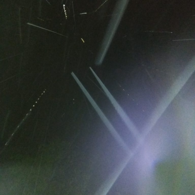 Night sky with streaks of light.