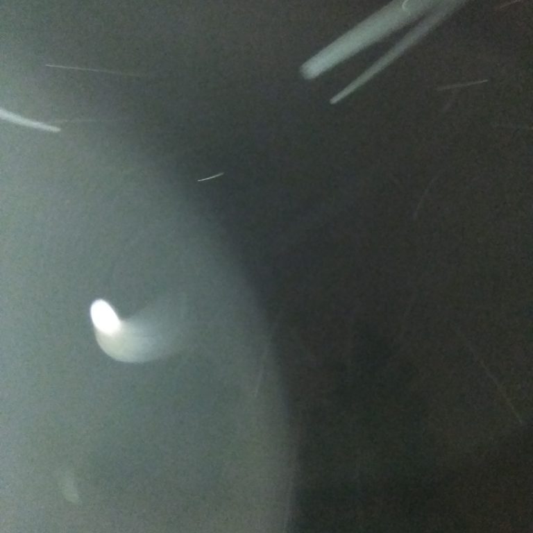 Blurry image with streaks of light.