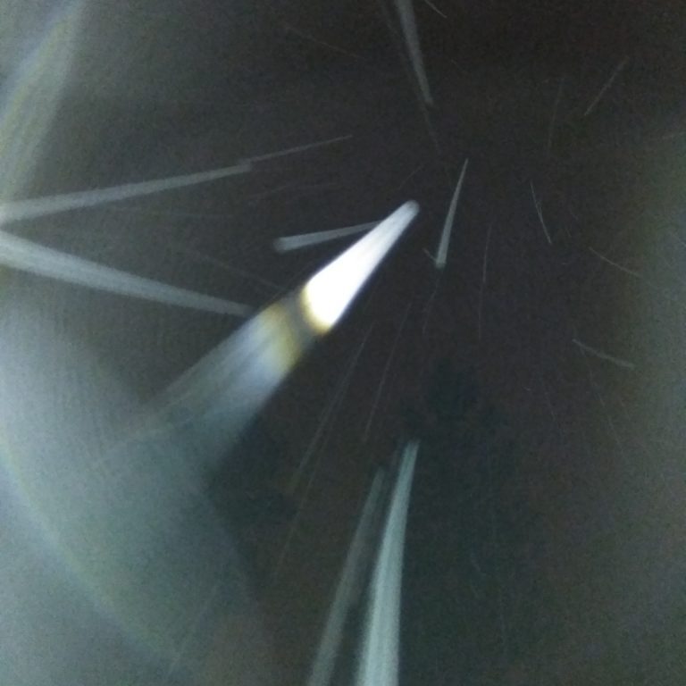Abstract light streaks in dark background.