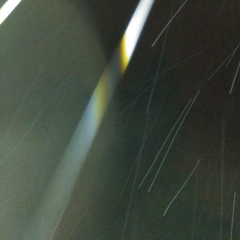 Abstract light streaks in dark background.