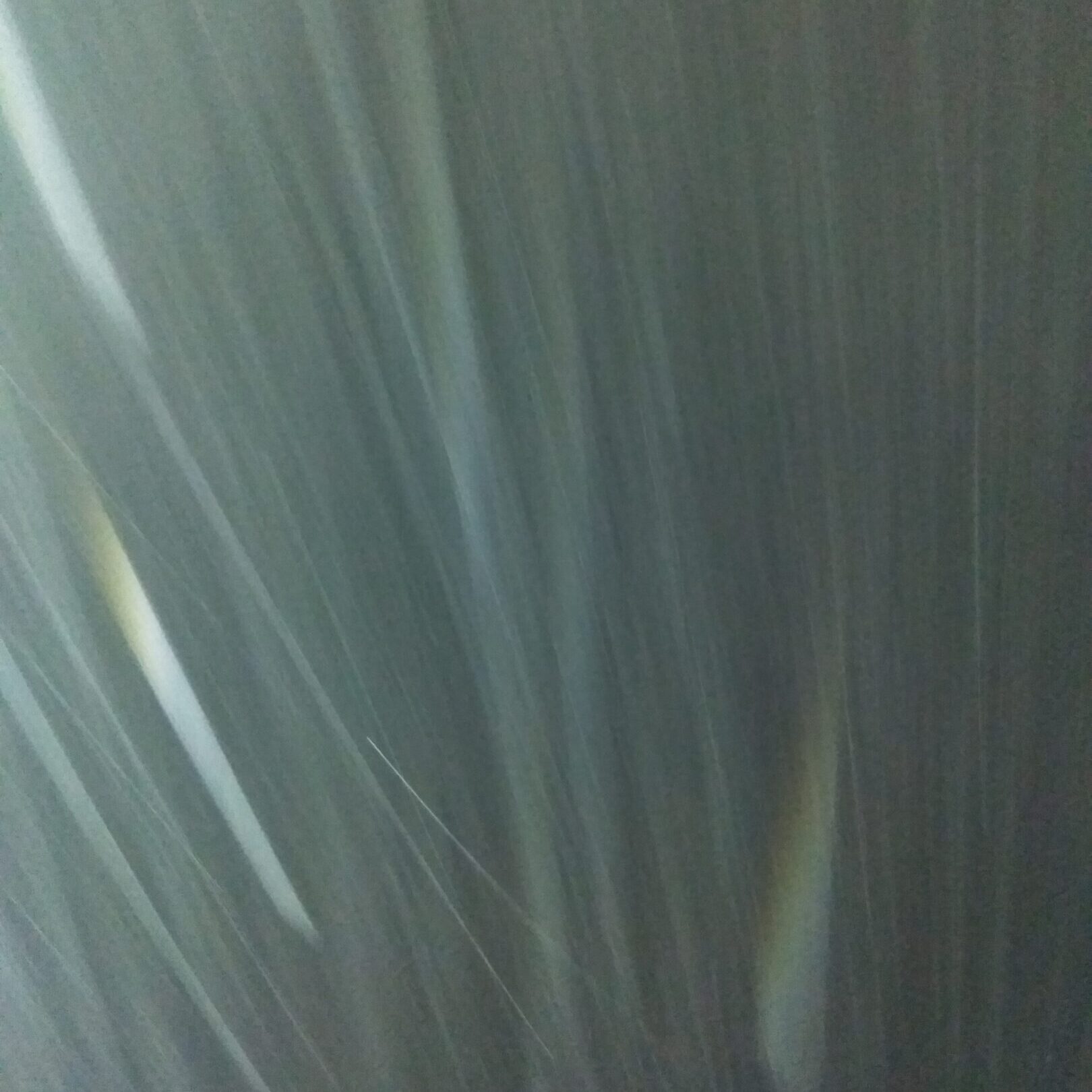 Blurred vertical lines in motion effect.