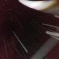 Abstract light trails in dark background.