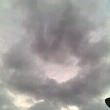 Cloudy sky with dark, overcast clouds.