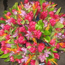 Vibrant bouquet of tropical flowers and leaves.