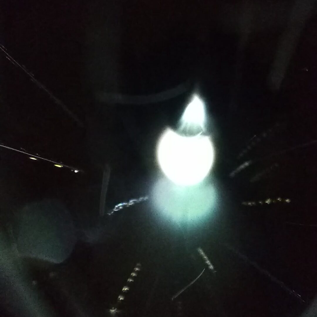 Bright light against a dark background.